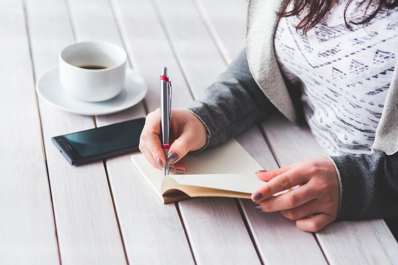 Woman, write, notepad — "Driving Innovation: Dr. Robert Corkern's Contributions to Emergency Medical Technology"