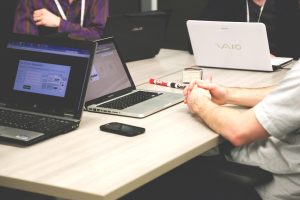 Laptops, meeting, businessmen — Nangs Delivery Brisbane Simplifies Your Entertaining Needs