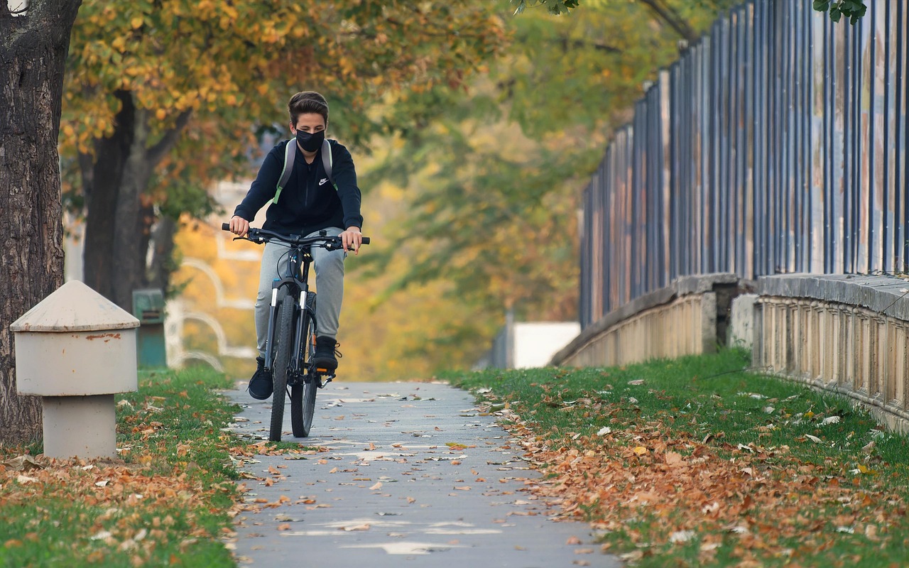 Bike ride, man, nature — Revive and Relax Massage Tips for Business Travel Recovery